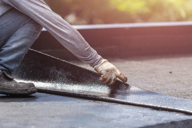 Professional Basement Waterproofing technician working in Milford, NJ